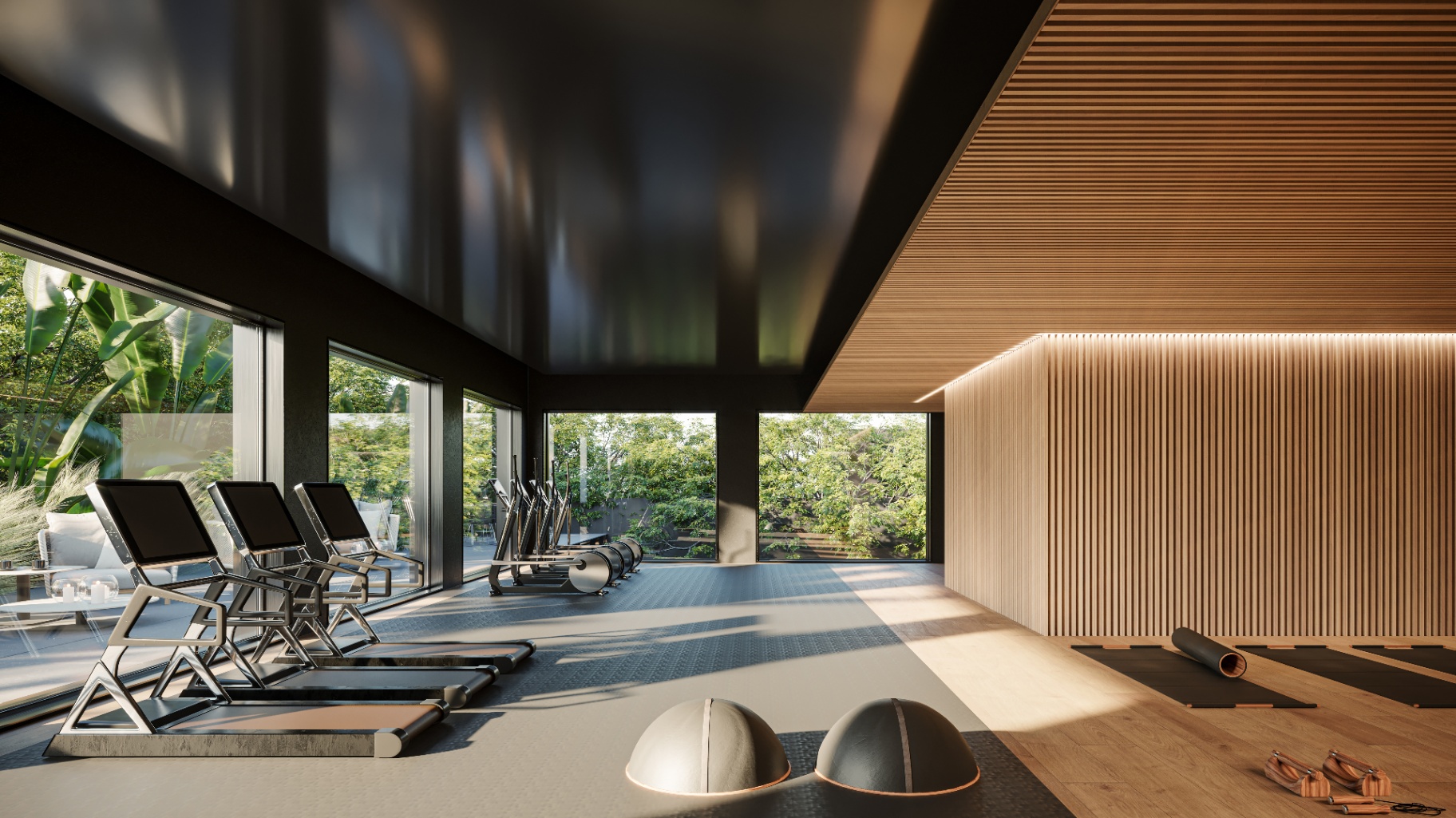 Gym de BOLD Barrancas con ventanales al jardín